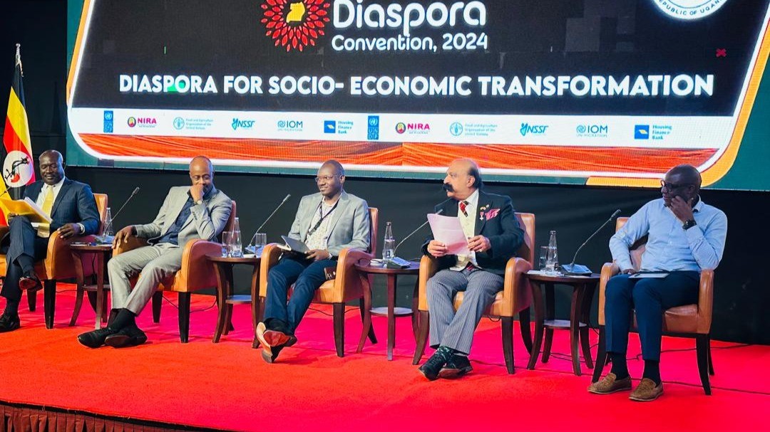 Panel discussion on stage at the 2024 Uganda Diaspora Convention on socio-economic transformation